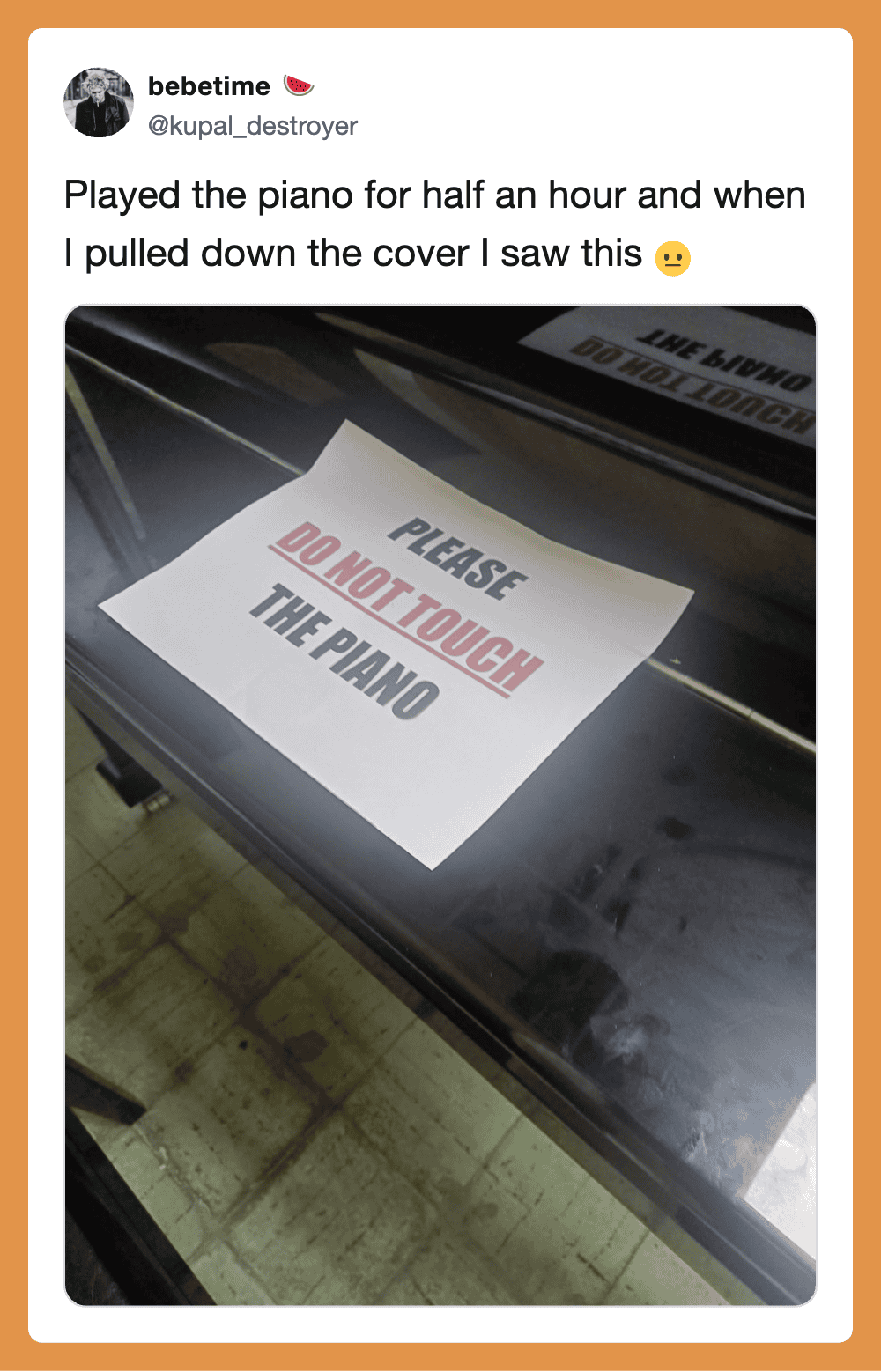 Sign on piano that says 'Please Do Not Touch The Piano'.