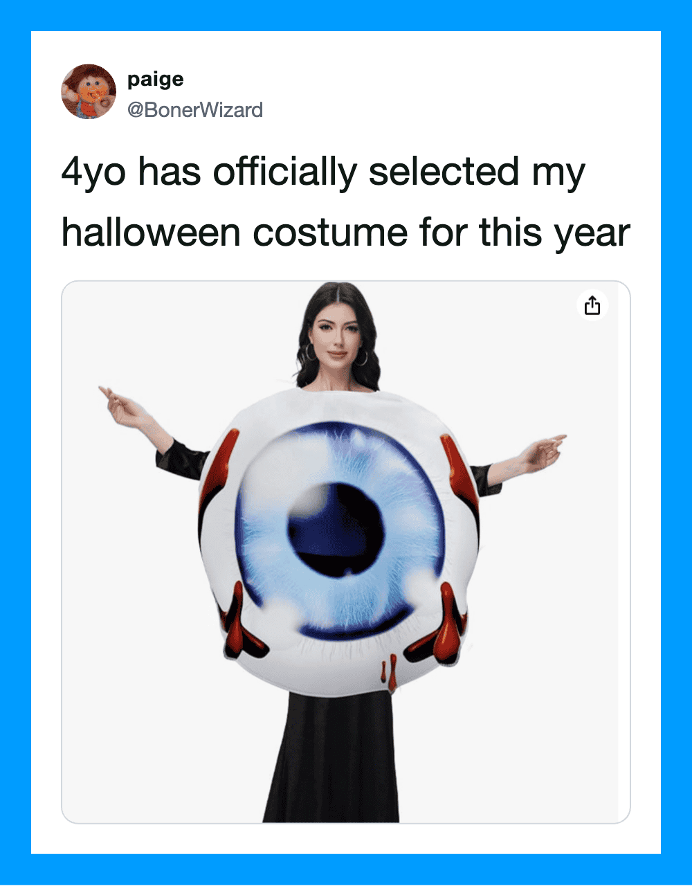 Girl in a costume with a large eye design, Halloween-themed, for a 4-year-old.