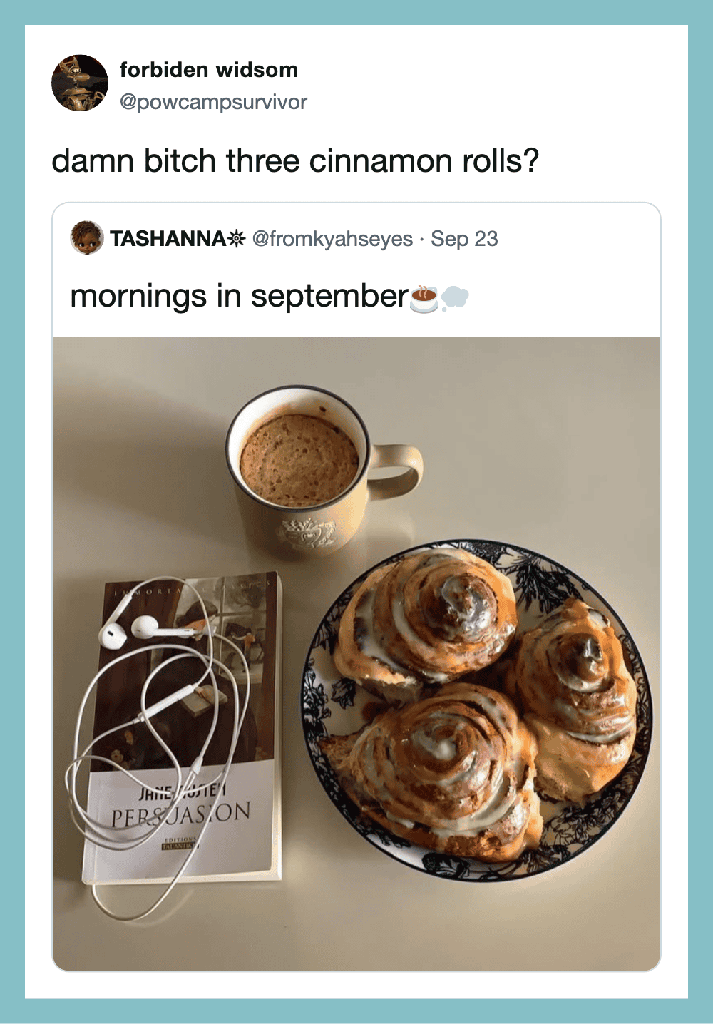 Photo of a coffee mug and a plate of cinnamon rolls on a table.