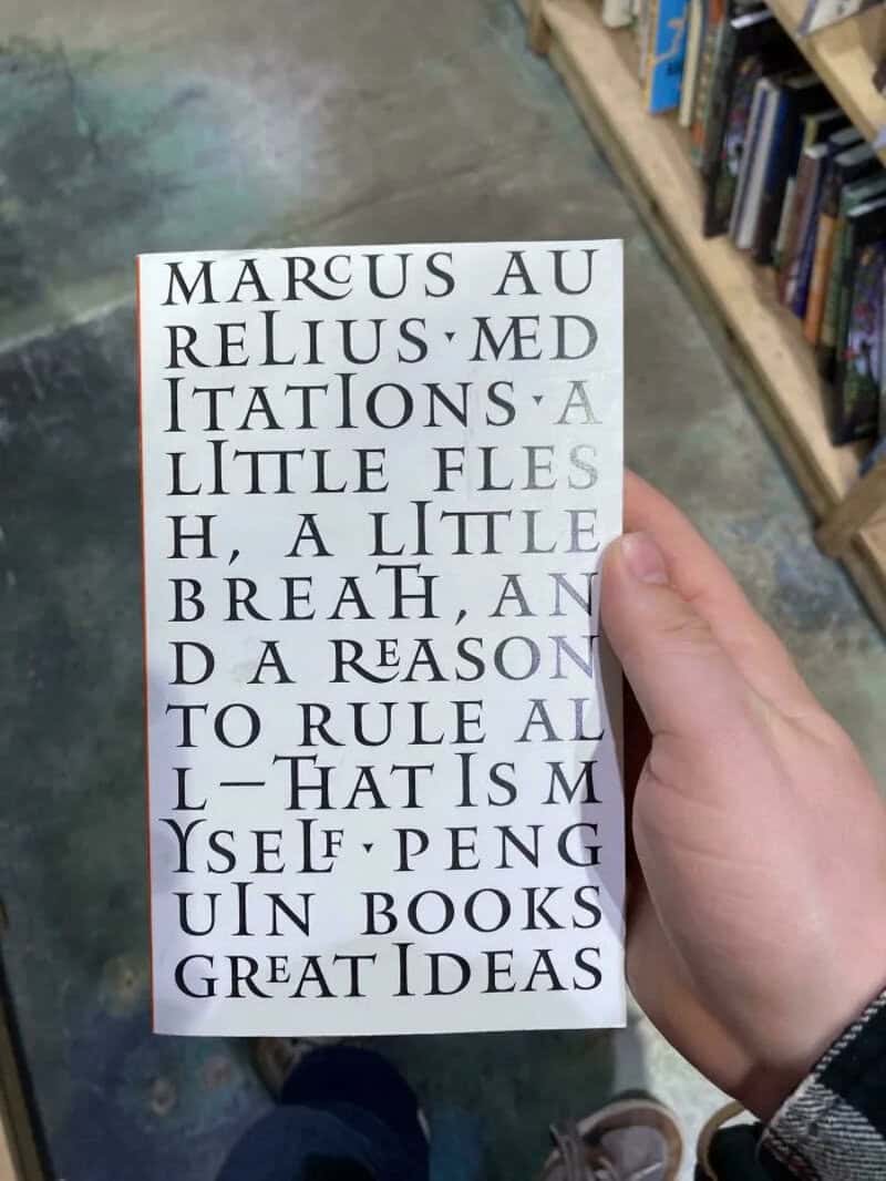 Book cover with text about Marcus Aurelius' meditations and philosophy.