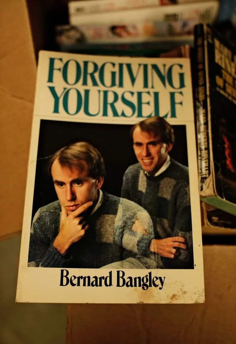 Book cover titled 'Forgiving Yourself' by Bernard Bangley with two men on the cover.