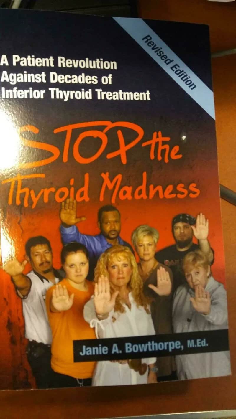 Book cover titled 'STOP the Thyroid Madness' with a group of diverse people holding up their hands.