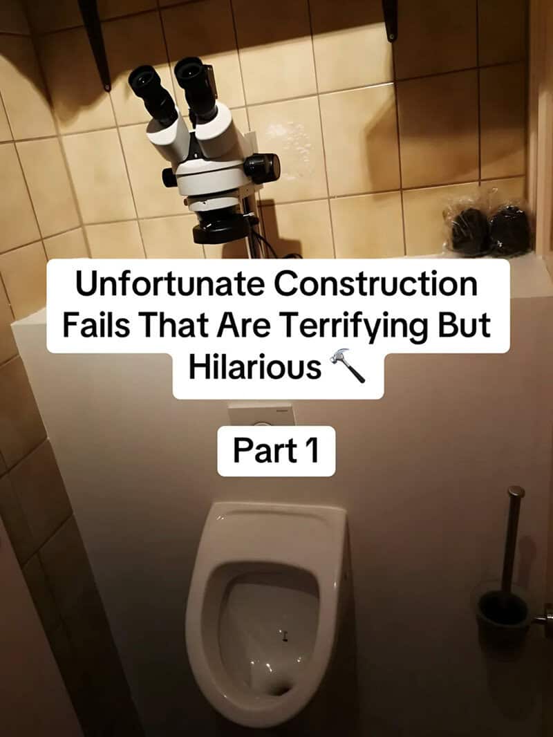 Unfortunate construction fail with a telescope mounted above a toilet in a bathroom.