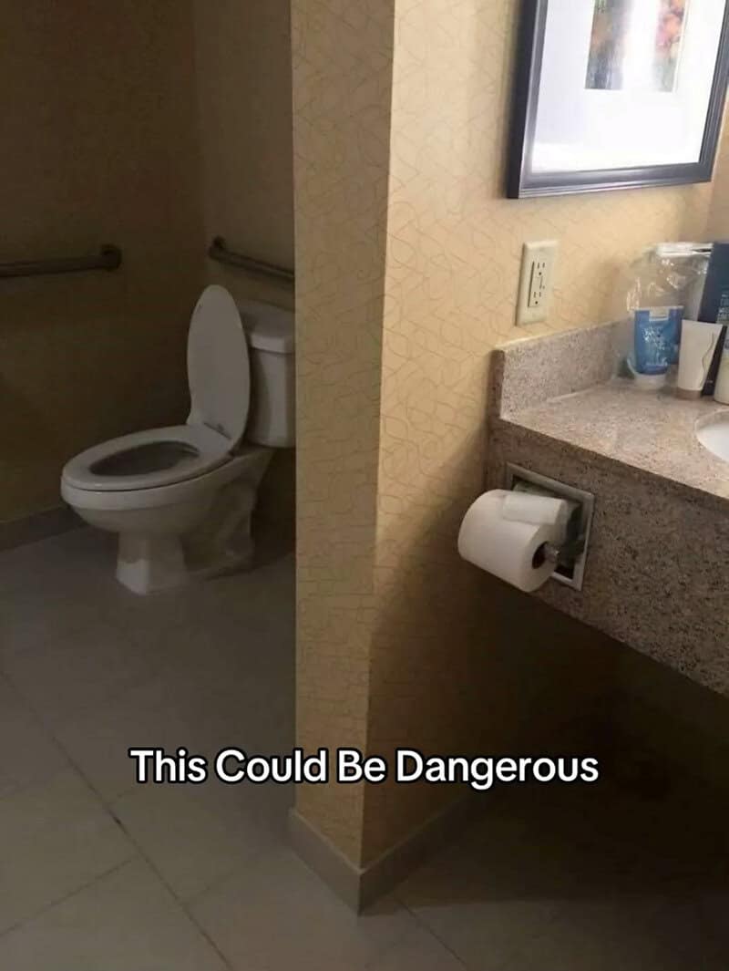 Toilet and bathroom sink with a caption 'This Could Be Dangerous'.