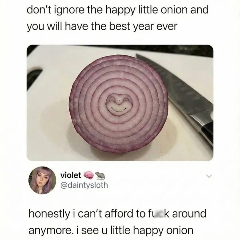 Onion with a happy face pattern and a knife nearby, with text about a happy onion.
