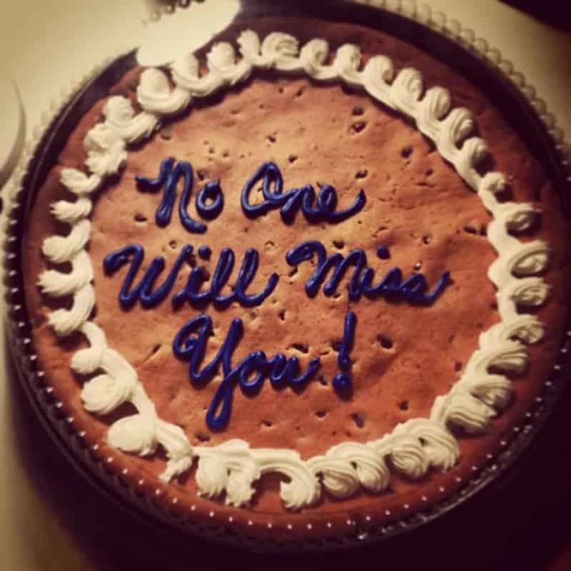 Cookie with blue icing message 'No One Will Miss You!' surrounded by white icing border.