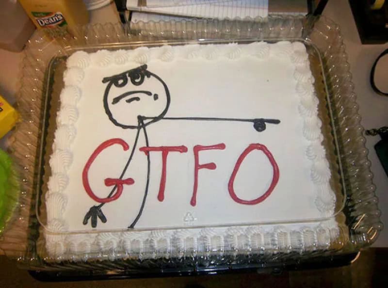 Cake with a stick figure drawing and 'GTFO' written on it.