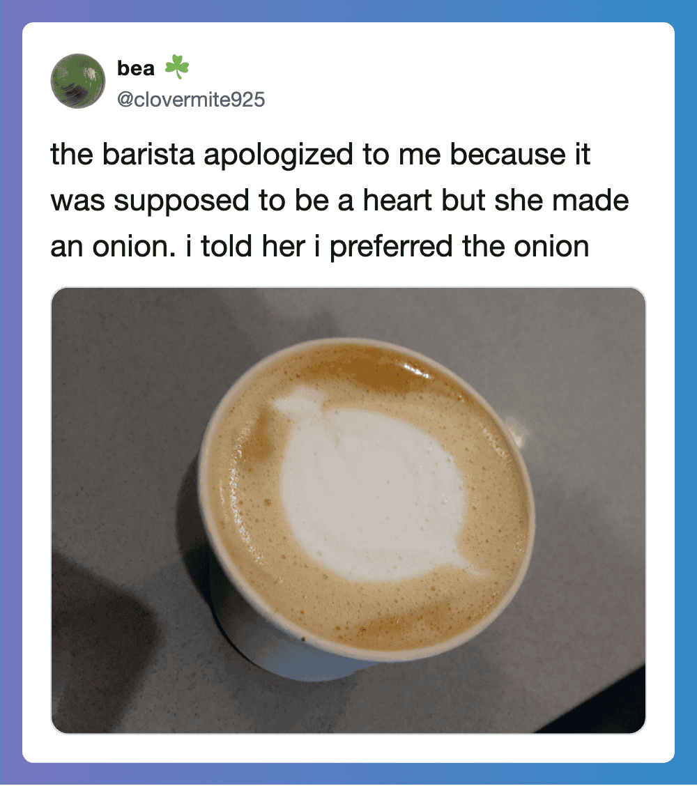 Coffee with a heart-shaped foam design on top, posted in a tweet about onions and a barista.