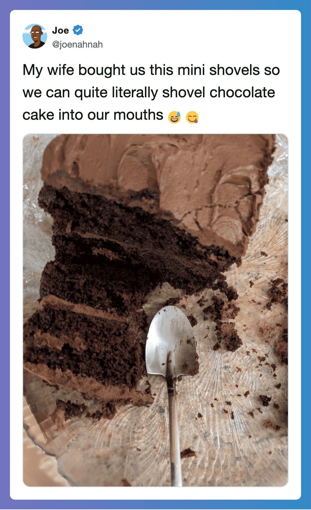 Mini chocolate shovels with a spoon on a wooden surface.