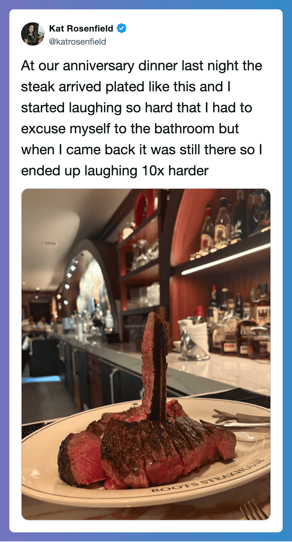 Steak dinner with a large bone, cooked medium rare, on a plate at a restaurant.