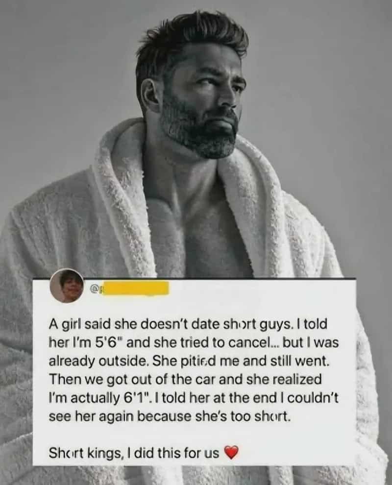 A man with a beard in a bathrobe, looking serious, with a social media post about height.