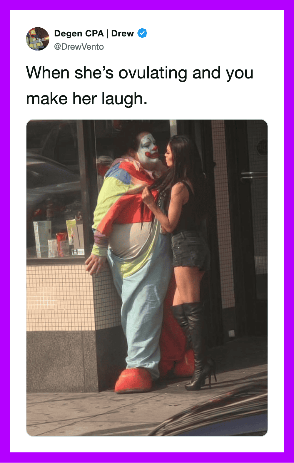 Clown and woman laughing on the street, with the clown in colorful costume and makeup.