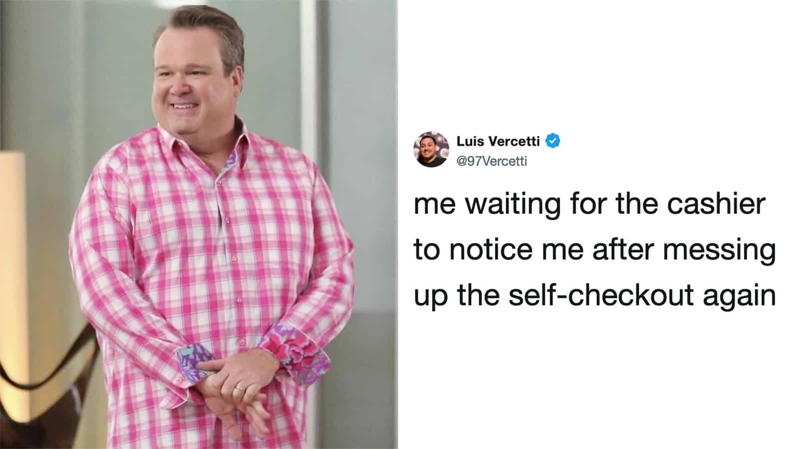 Man in pink checkered shirt waiting at self-checkout, smiling.