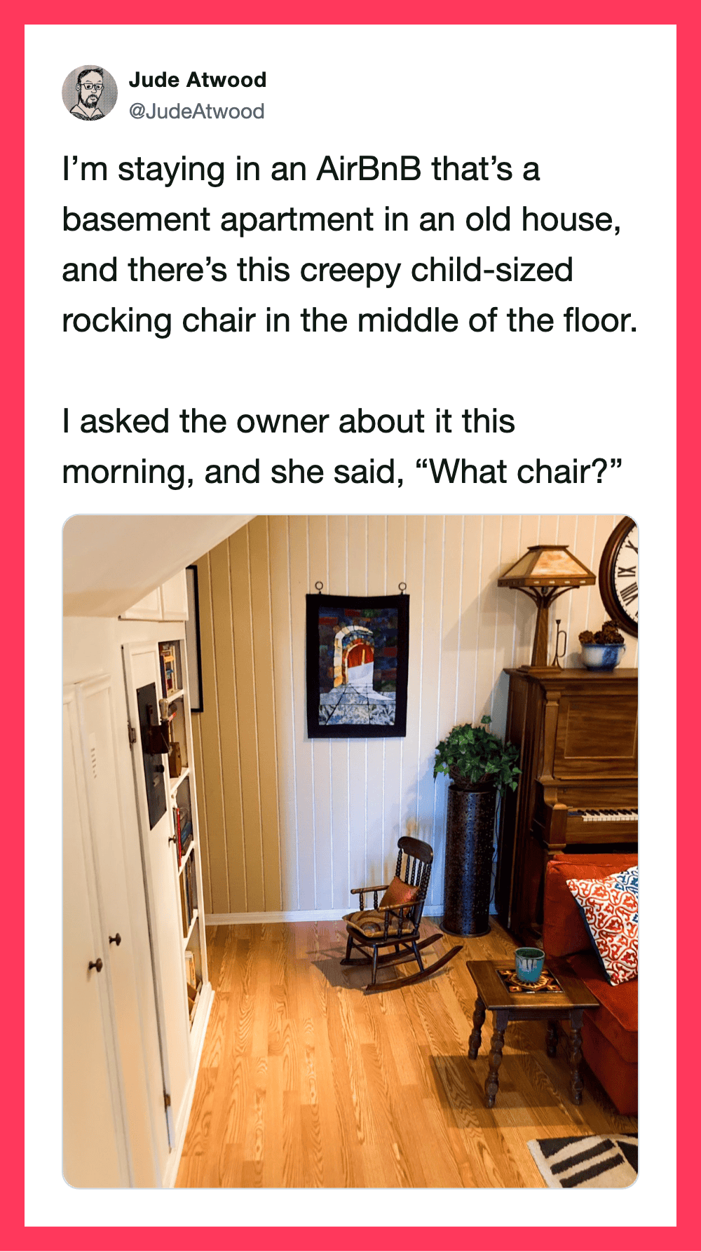 Cozy basement apartment with rocking chair, piano, and colorful artwork.