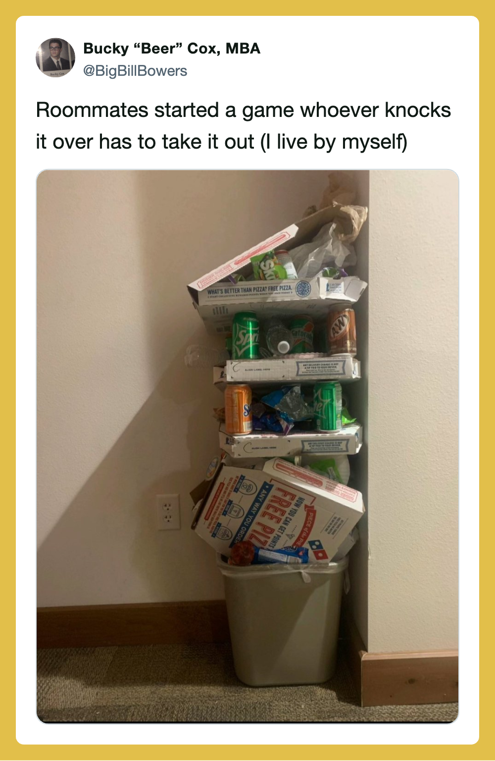 Stack of snack and cereal boxes in a trash can, knocked over by roommates.
