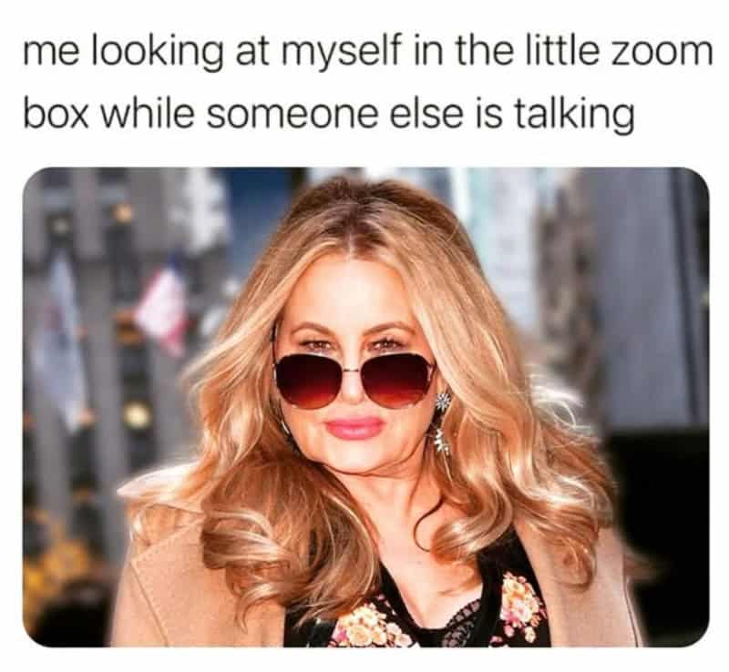 Woman with sunglasses looking at herself in a zoom box, caption about self-awareness.