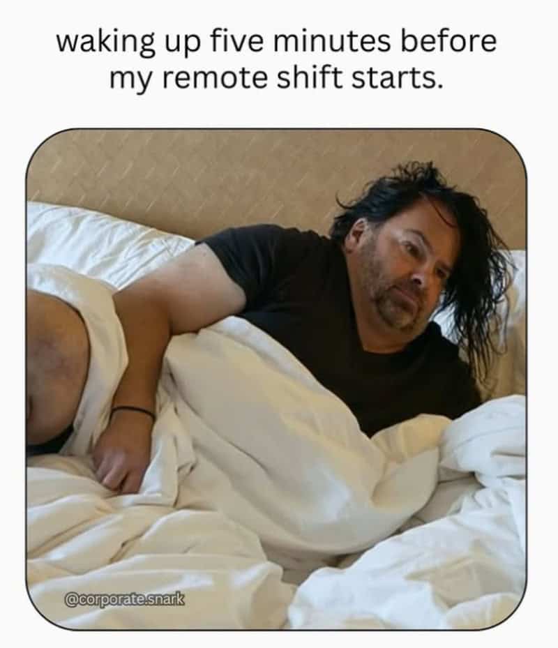 Man waking up in bed before his remote shift starts.