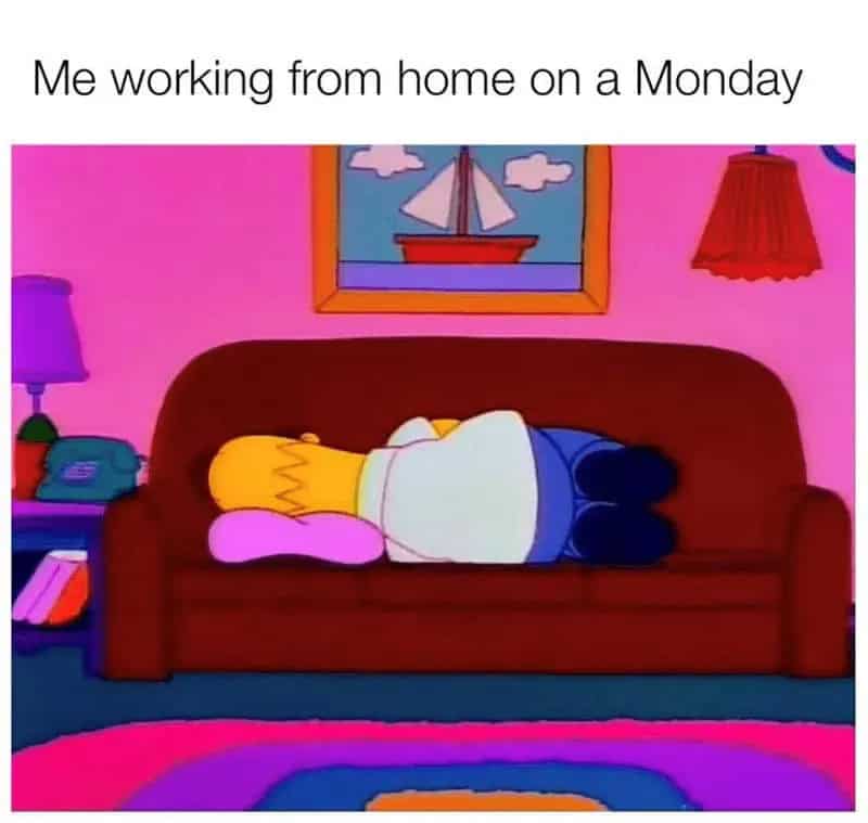 Person working from home on a Monday, lying on a sofa with a pillow, in a colorful room.