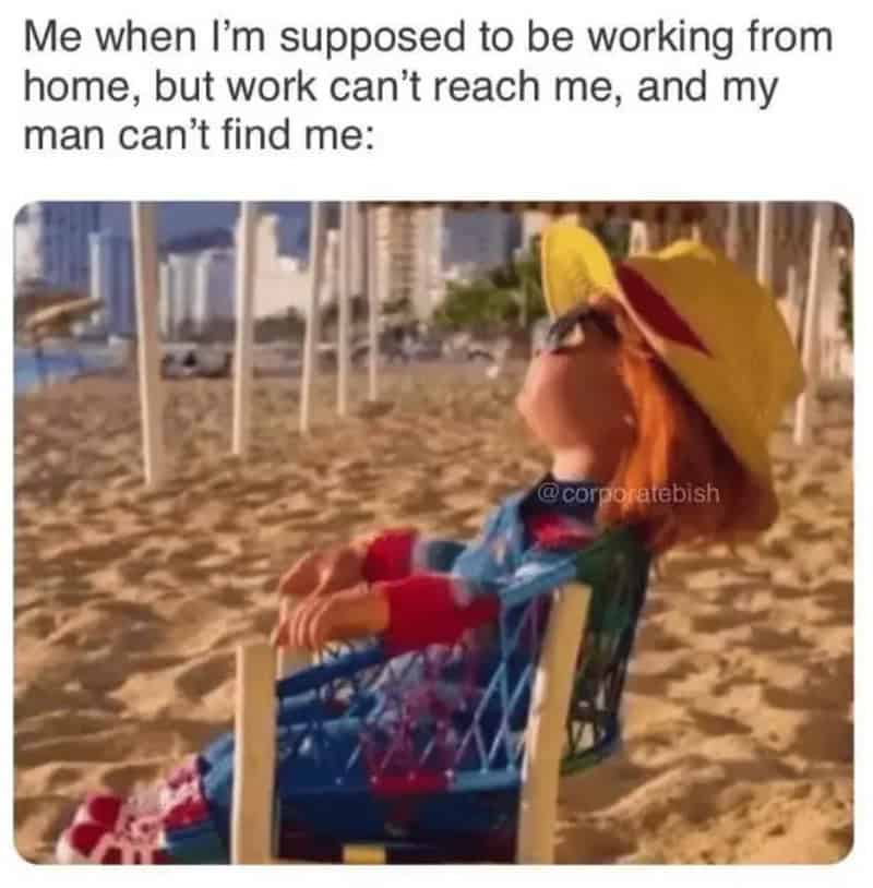 Child in beach chair with hat, sunglasses, and colorful clothes, relaxing on the beach.