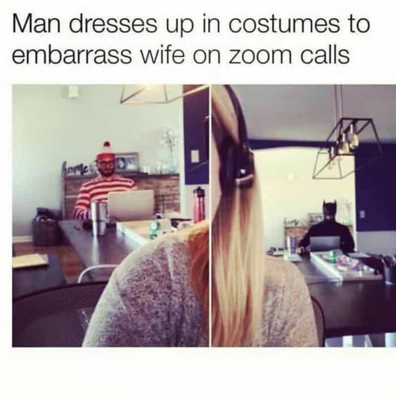 Man dressed in costume to embarrass wife on Zoom call, with a cat in the background.