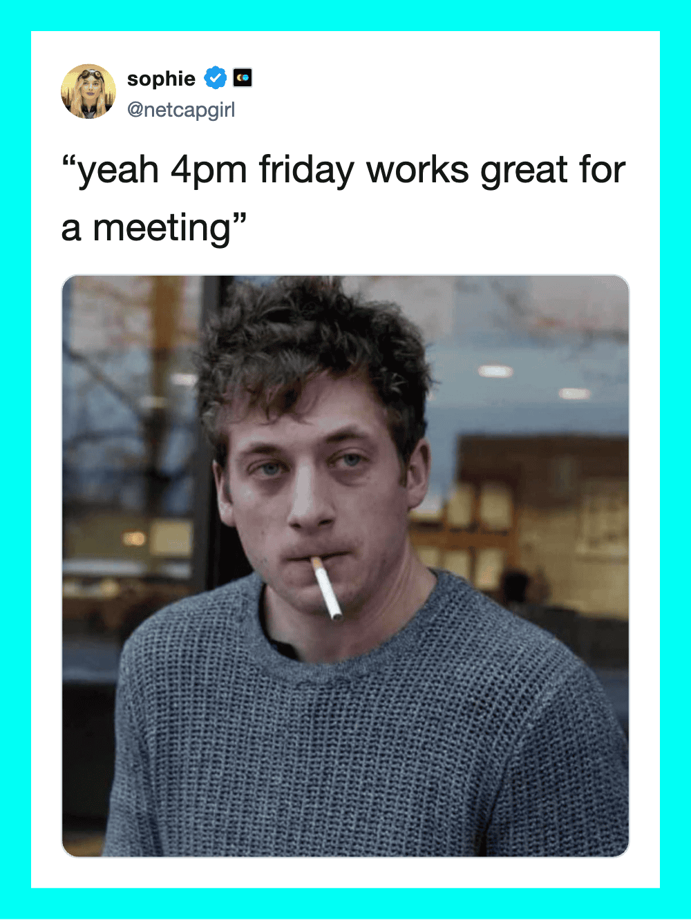 Young man with messy hair and cigarette in mouth, looking tired.