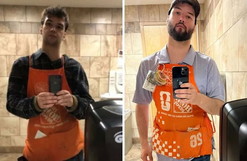 Two men taking mirror selfies in a store, both wearing orange aprons.