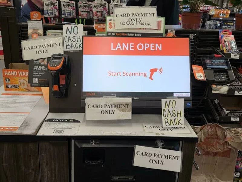 Digital sign says 'LANE OPEN' and 'Start Scanning' at checkout.