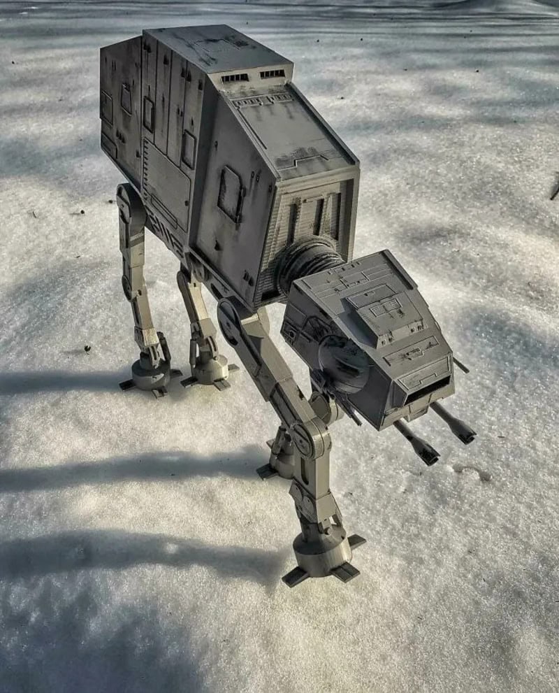 3D printed AT-AT walker from Star Wars on a snowy surface.