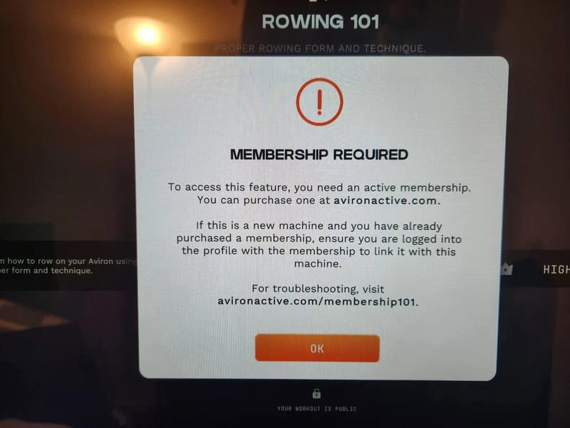 Membership required message on rowing machine screen.