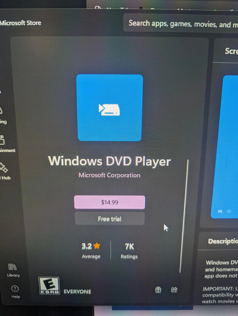 Windows DVD Player app with price and free trial option on screen.