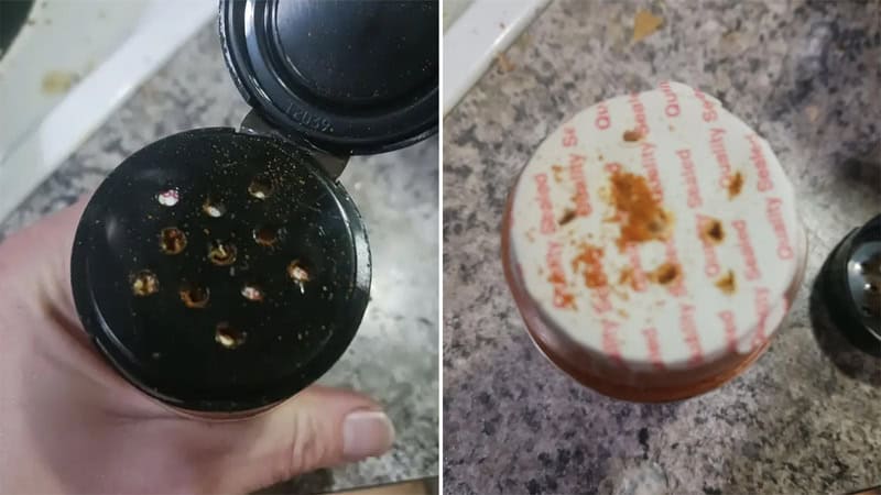 Dirty bottle cap with holes and a used tea bag on a countertop.