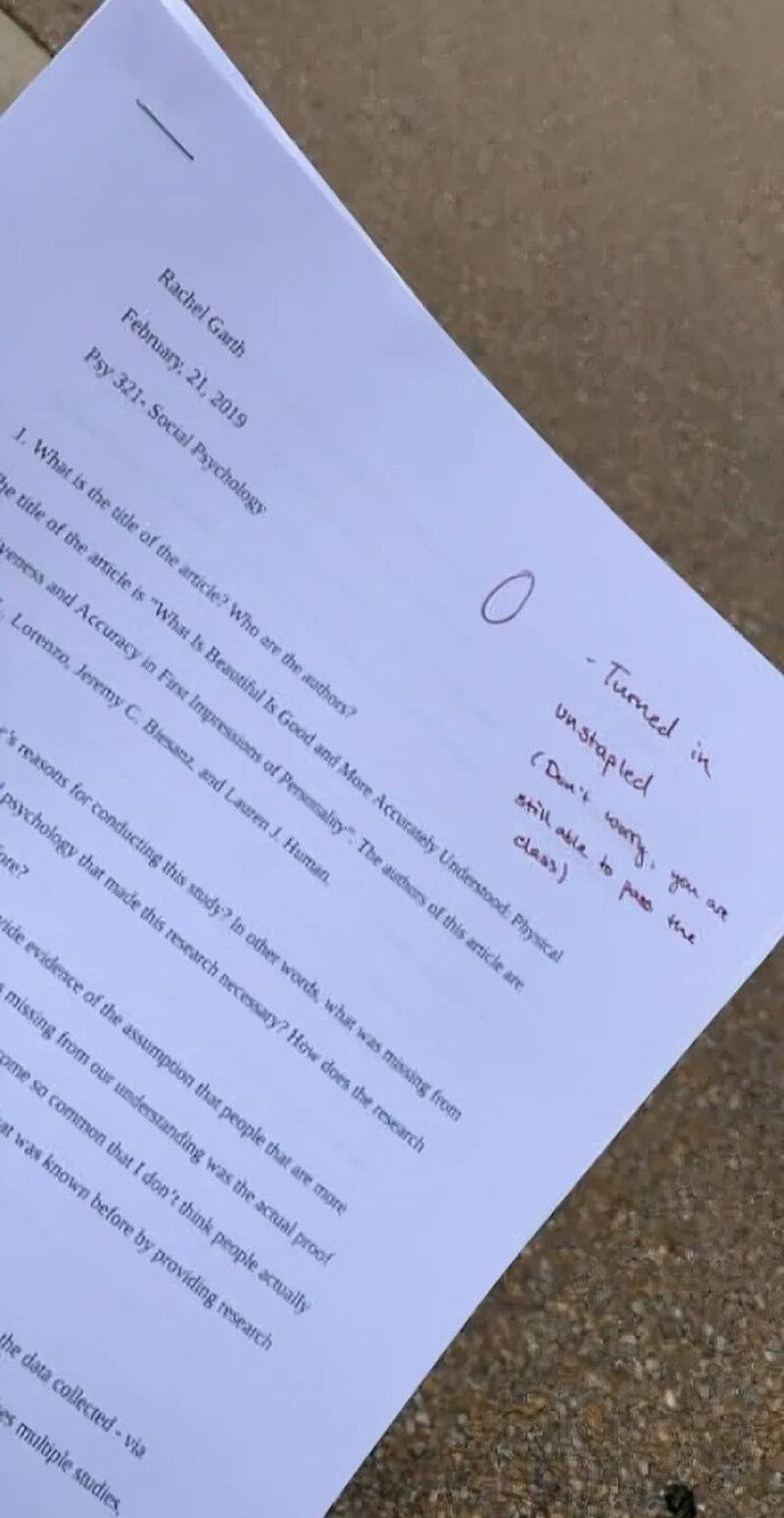A printed exam paper with handwritten notes and a circle around a question.