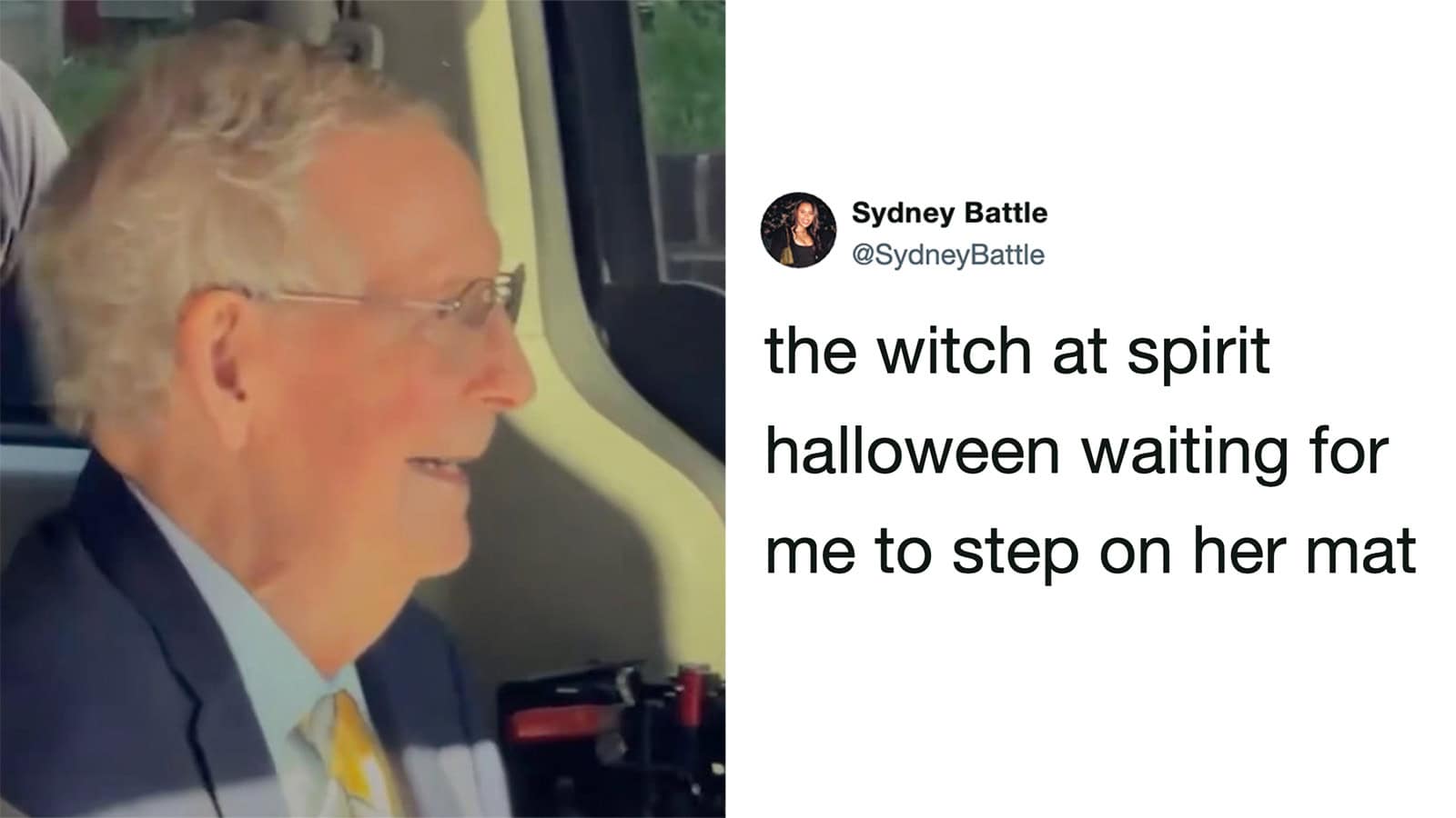 Senator Mitch McConnell smiling on a bus, wearing glasses and a suit.