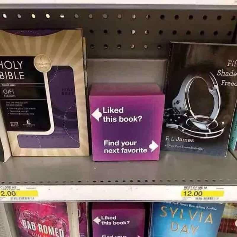 Shelf with books and a pink cube with 'Liked this book? Find your next favorite'.