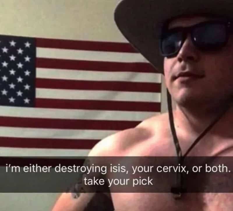Person wearing sunglasses and a hat with an American flag in the background.
