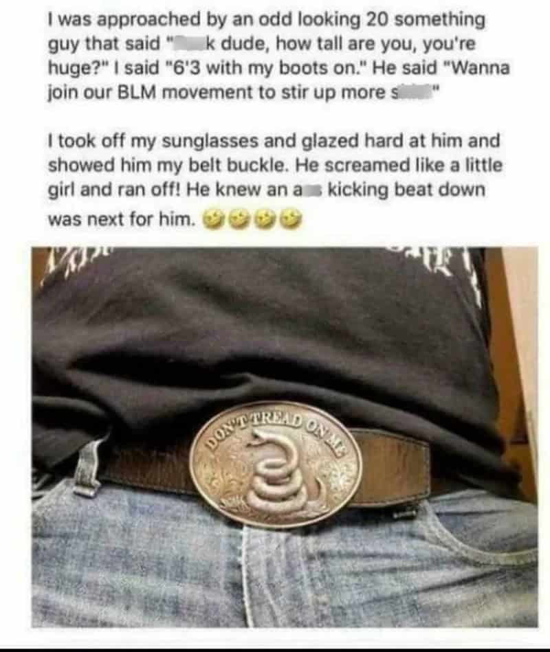 Belt with a large buckle featuring a snake and the words "DON'T TREAD ON ME".