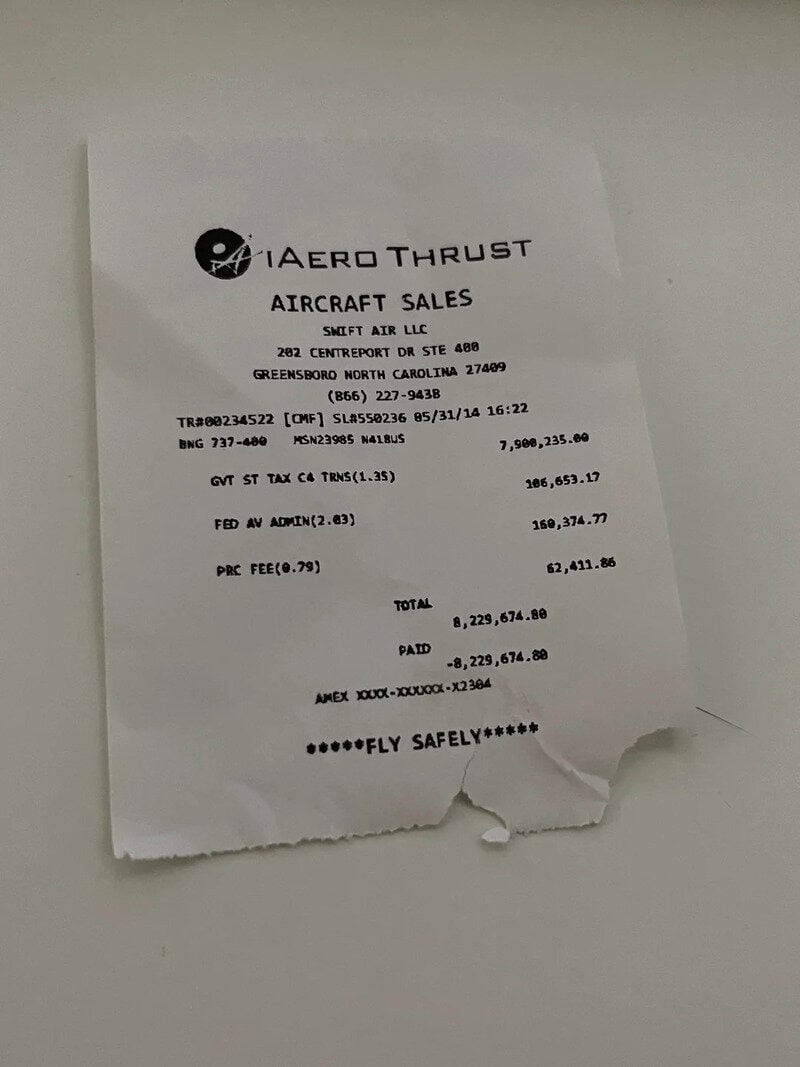 A torn receipt from Aero Thrust Aircraft Sales with details of a transaction.