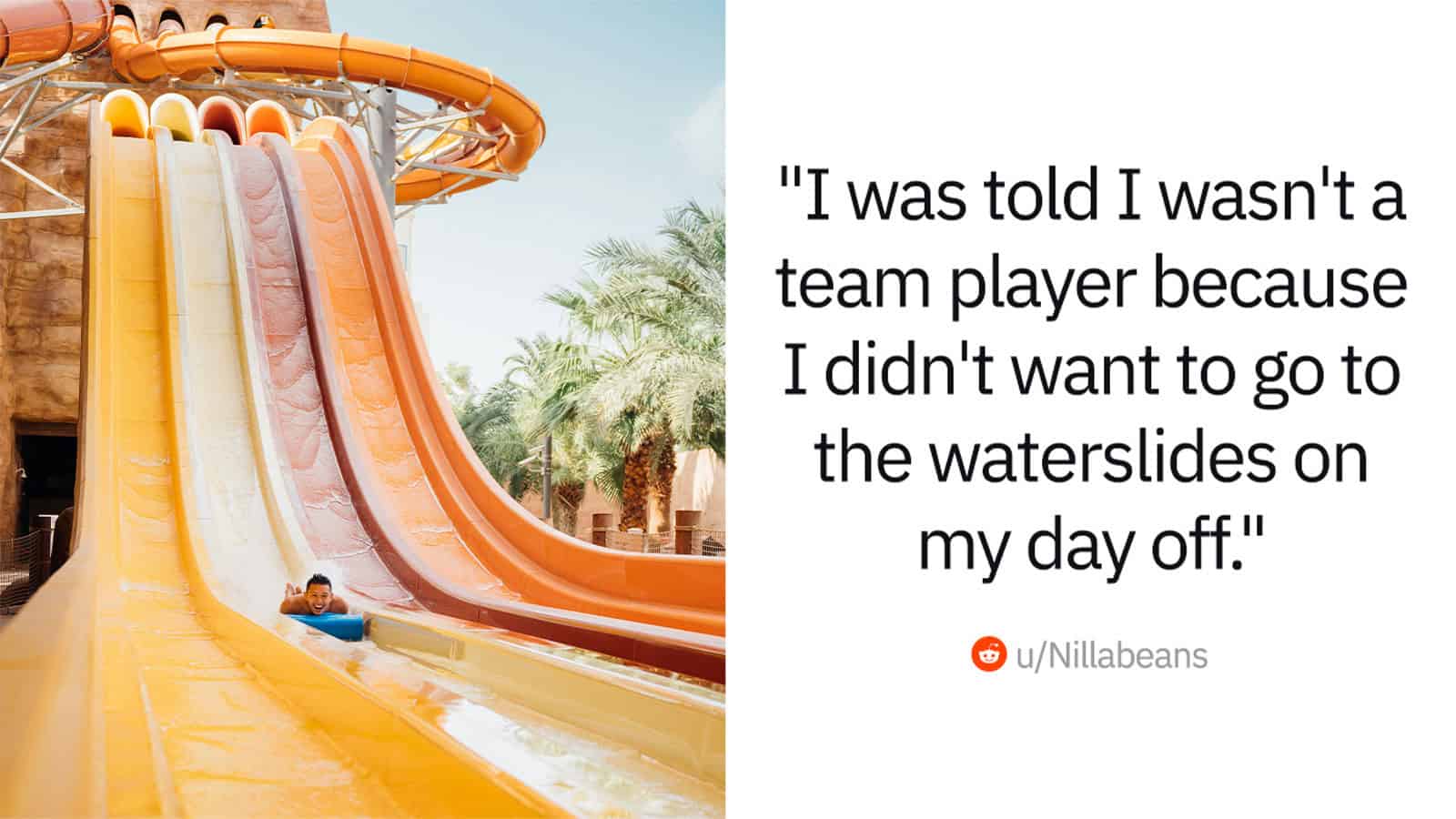 Water slide at a waterpark with a person sliding down.