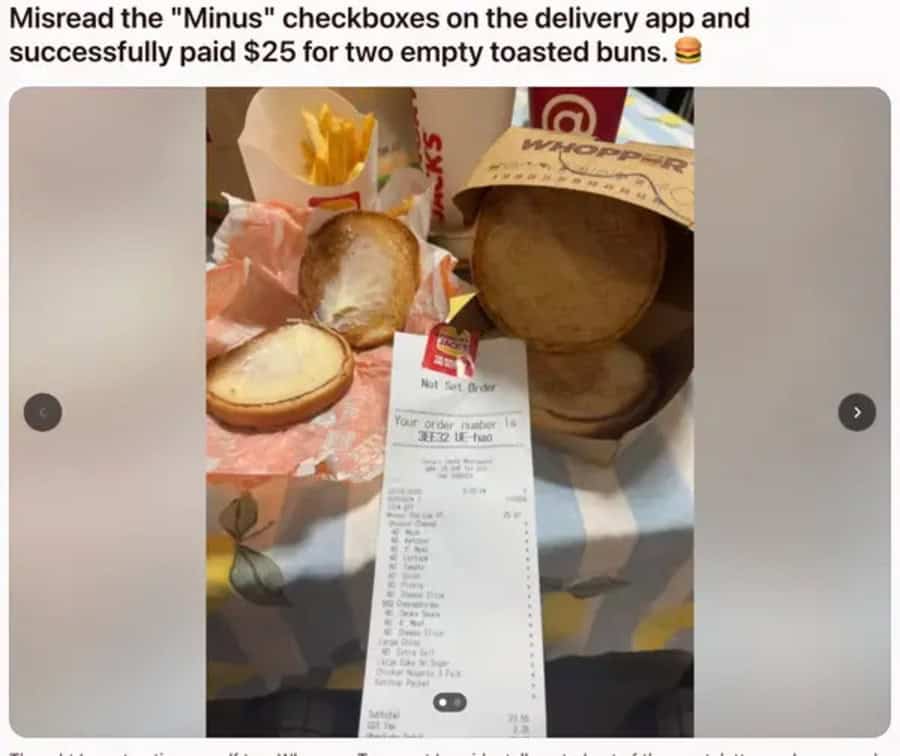 Empty toasted buns, fries, and a receipt on a table.