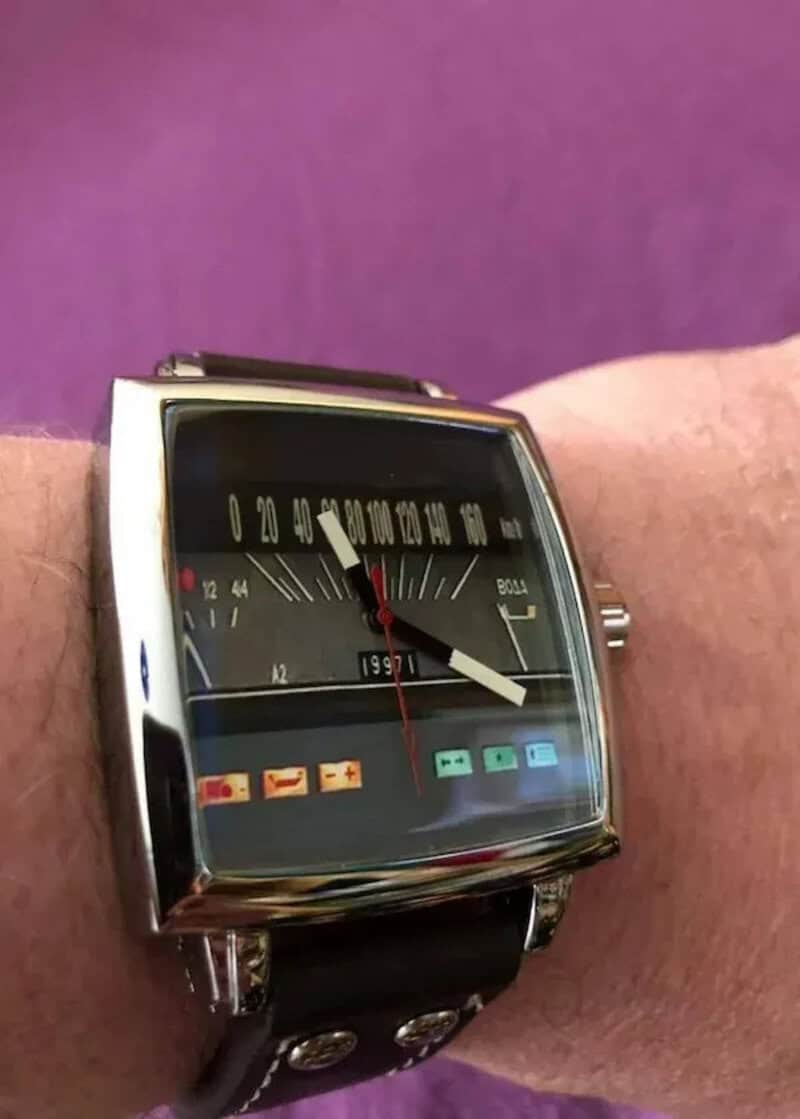 Retro watch with a unique dial design and colorful icons.