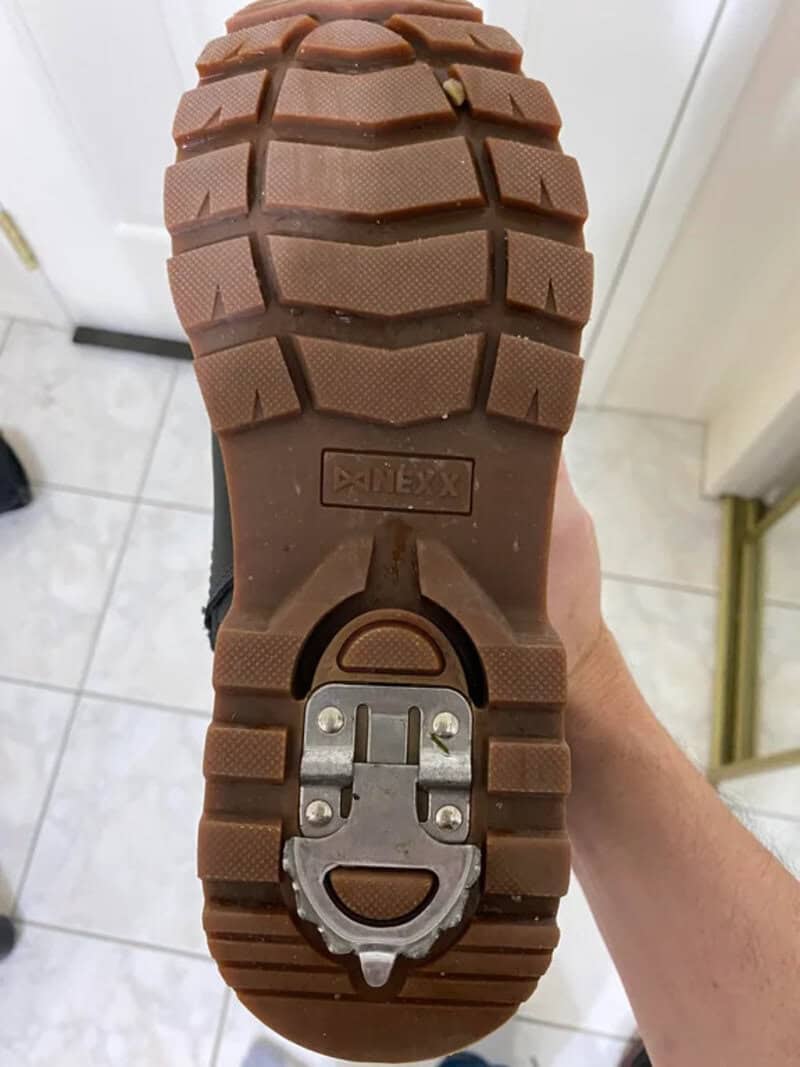 Shoe sole with a hidden bottle opener in the heel area.