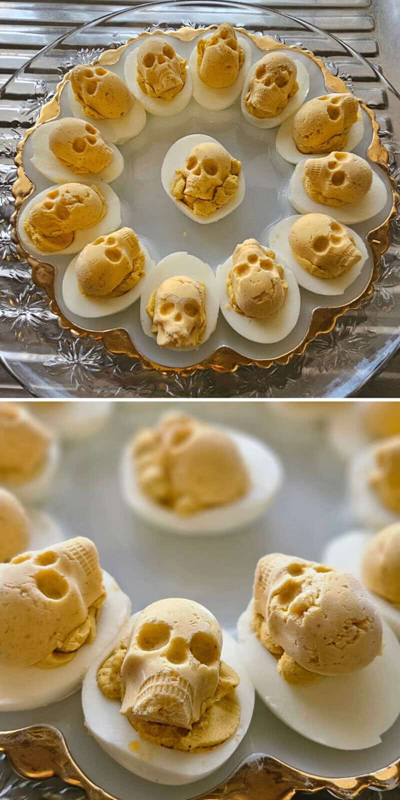 Skull-shaped treats arranged on a ring of white eggs in a clear glass platter; Halloween-themed egg.