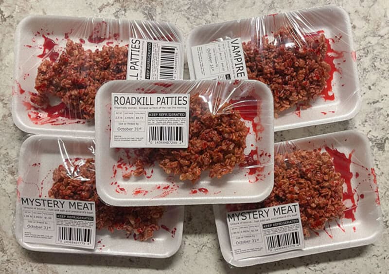 Roadkill Patties with mystery meat labeled packaging on white trays.