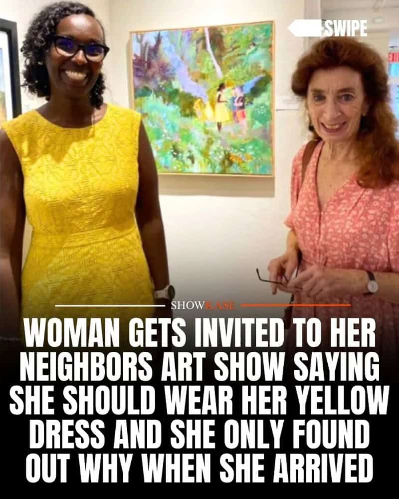 Woman in yellow dress and woman in pink dress at art show with colorful painting behind them.