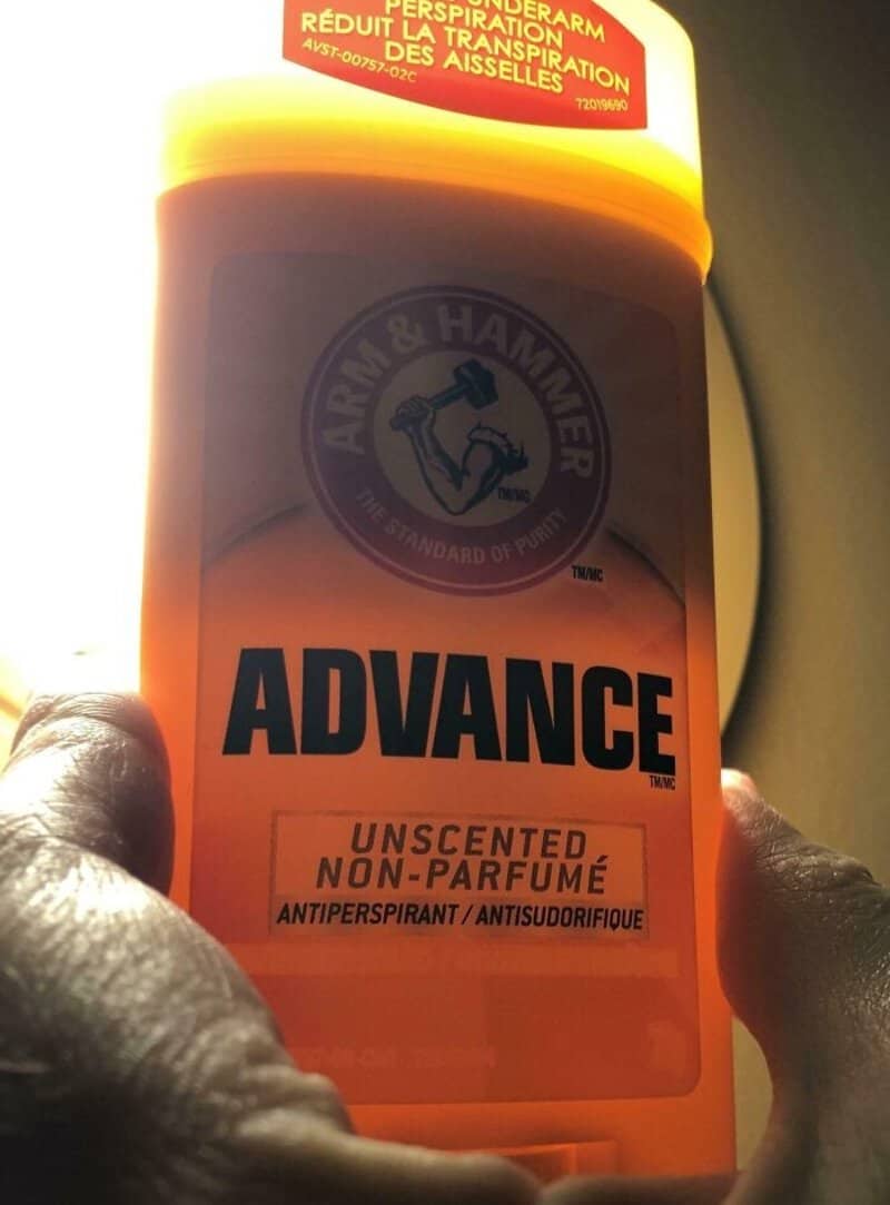 ADVANCE antiperspirant deodorant bottle by Arm & Hammer, unscented, with label visible.