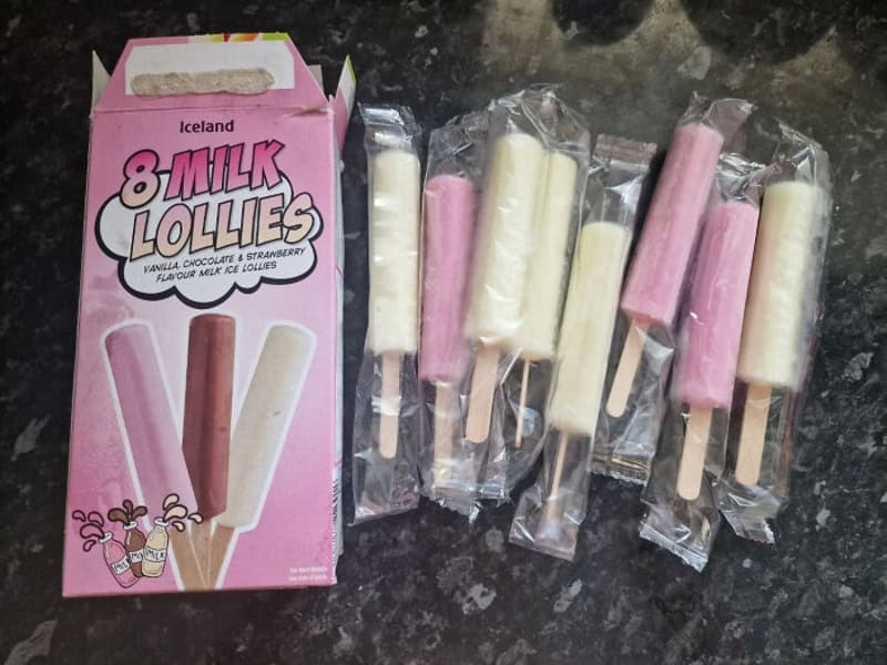 Carton of Iceland 8 Milk Lollies with assorted pink and white popsicles on sticks, packaging shows a.