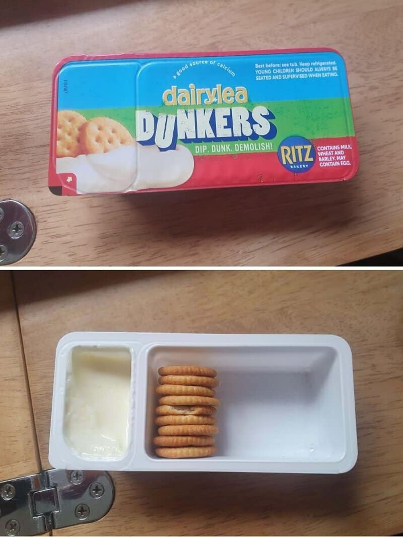 Dairylea dunkers packaging with blue and pink lid and a tray of crackers inside.