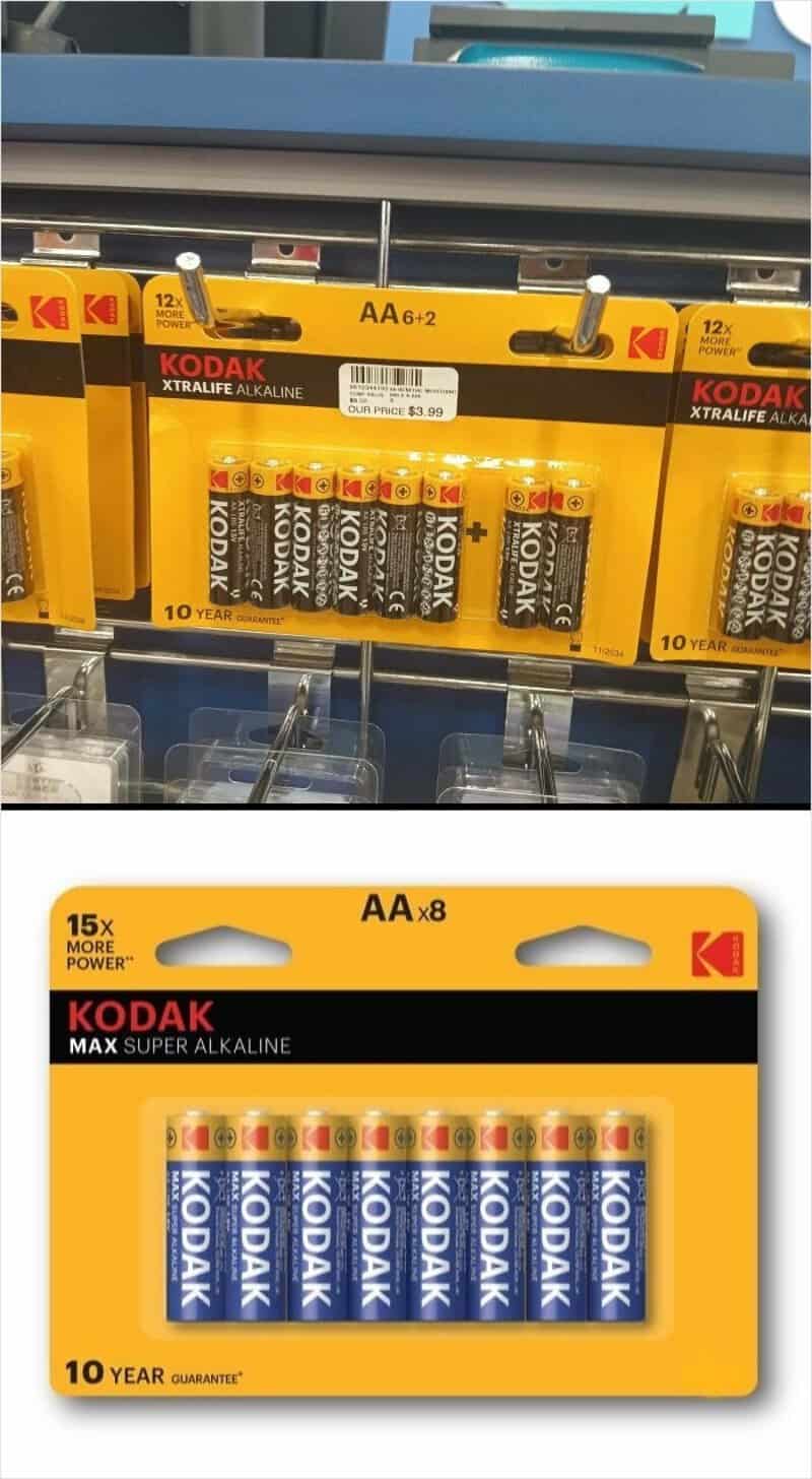Kodak AA alkaline batteries displayed on a store shelf and in packaging.