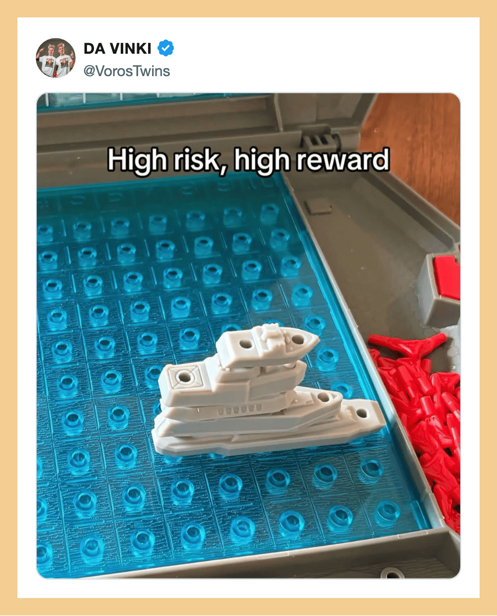 High risk, high reward text over blue LEGO-like base with white plastic ship model placed on it.
