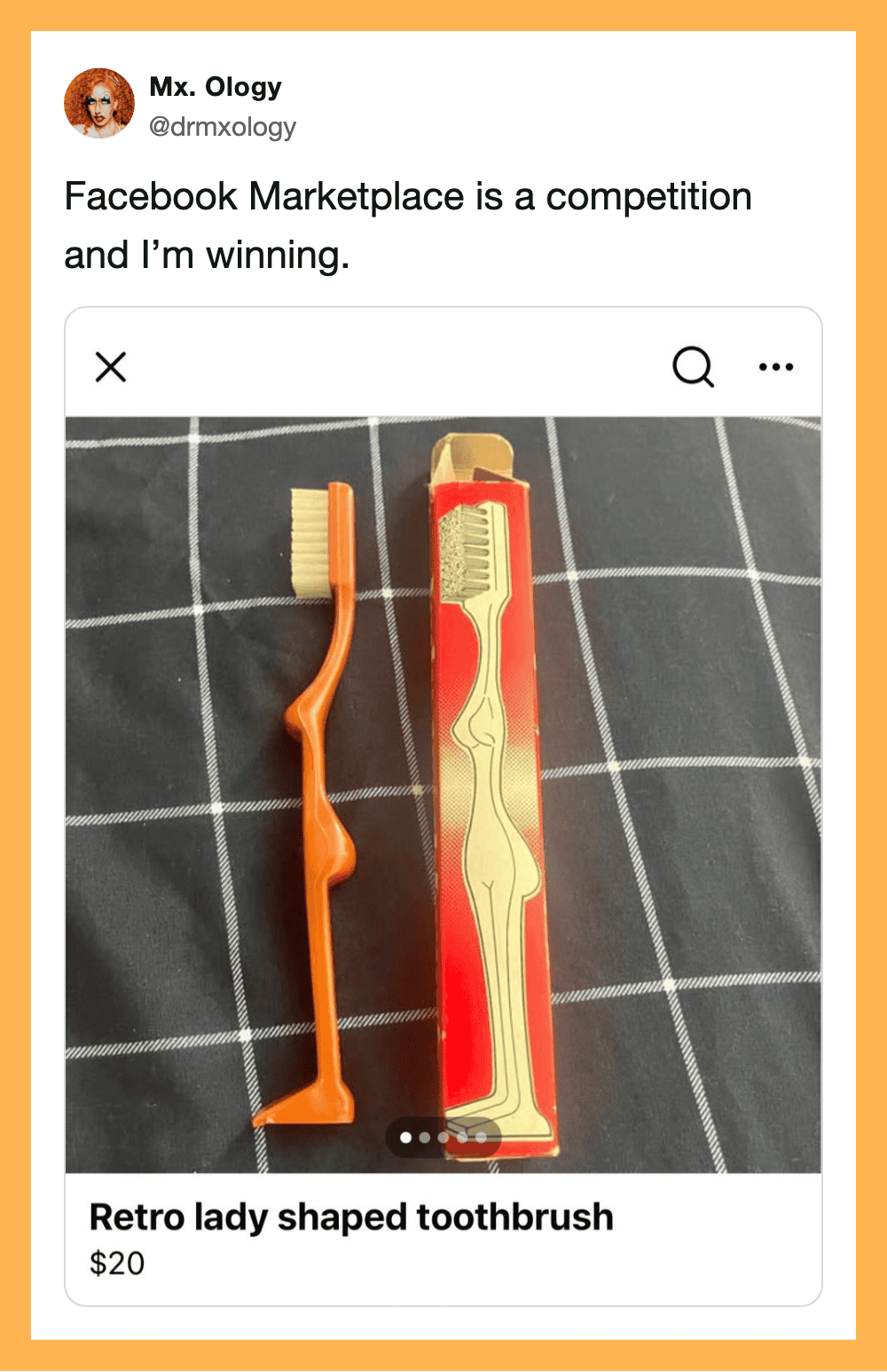 Retro lady shaped toothbrush next to its box on a checkered surface.